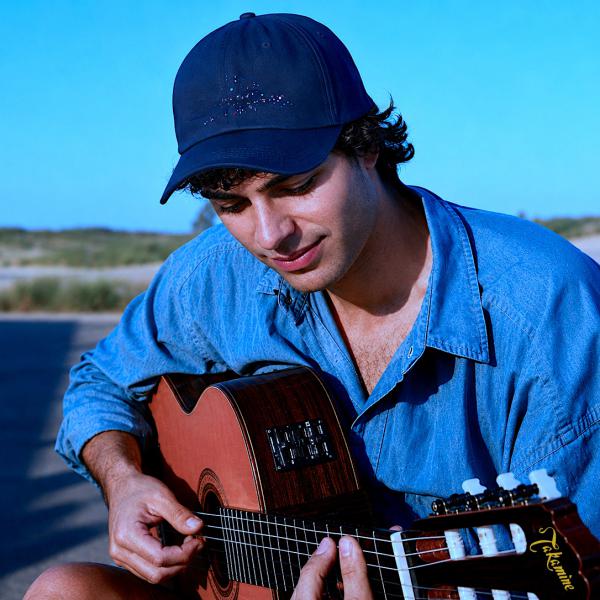 Andrés playing at the beach